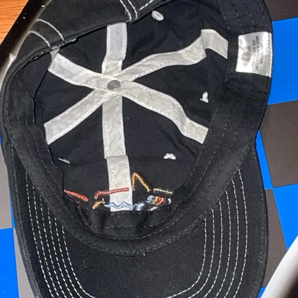 Greg Norman Collection Black and Orange Shark Decor Cap